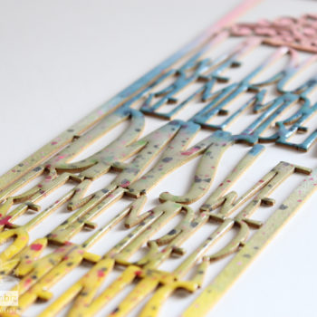 rainbow coloured chipboard - speckled ink